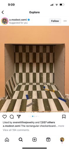 the inside of a cardboard box that has been painted black and white checkerboard