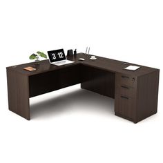 an office desk with two drawers and a clock on it