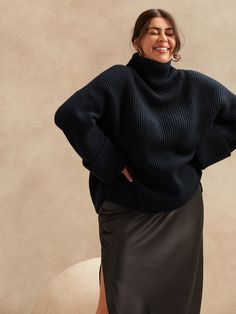 Dimensional and dynamic, this oversized sweater is expertly cut for a boxy fit with wide sleeves that play with proportions.  Take note: the high-slits at the sides allow you to show off high-waisted styles.  MERINO & CASHMERE: Weighty and warm, supe Cozy Oversized Sweaters, Mesh Sweater, Grey Turtleneck, Poncho Style, High Waist Fashion, Banana Republic Sweater, Knit Sleeve, Comfy Fashion, Hem Style