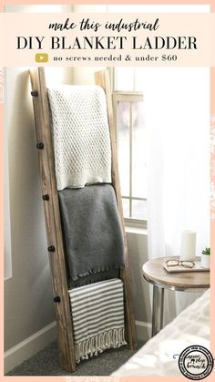 a ladder leaning against the wall with blankets on it and text overlay that reads make this industrial diy blanket ladder