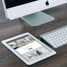 an apple computer and ipad on a desk