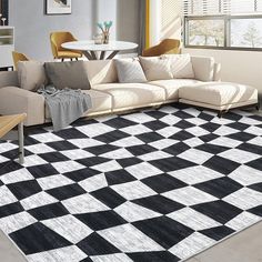 a black and white checkered rug in a living room