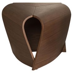 an unusual shaped wooden table with curved edges