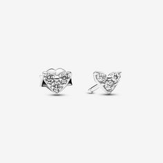 Big style comes in small packages with the Triple Stone Heart Stud Earrings. Three round stones are set in the shape of a heart in these sterling silver earrings. A heart-shaped butterfly back is a sweet finishing touch. Delicate and refined, these tiny heart stud earrings are a dainty addition to any look. They're also a perfect, versatile gift for a loved one, imbued with subtle meaning and elegant style. - Pandora Triple Stone Heart Stud Earrings - Sterling silver / Cubic Zirconia / Clear Tiny Heart, Heart Studs, Stone Heart, Heart Earrings Studs, Pandora Jewelry, Sterling Silver Earrings Studs, Lab Created Diamonds, Elegant Style, Sterling Silver Earrings