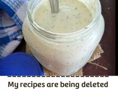 a jar filled with food sitting on top of a table