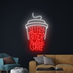 a neon sign that says sleep better with coffee on the wall next to a couch