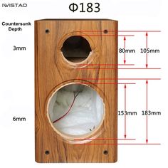 a wooden speaker is shown with measurements