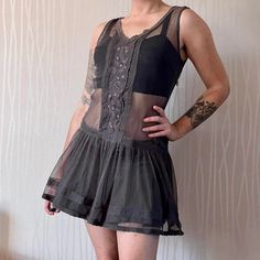 This adorable Y2K sheer drop waist minidress from the early 2000's is so sweet and grungy all at the same time! Perfect to layer over a slip dress or even a bra and jeans for a quirky y2k look! Features sheer lightweight construction, pleated drop waist skirt, V-neck cut, lace and embroidery down the front and on the hem/trim, mini length and grey beige colorway! No size tag but fits like a medium, measurements on pic 4 This piece has very light general wear and tear Drop Waist Skirt, Layer Dress, Grey And Beige, Drop Waist, Dress Clothes For Women, Netherlands, Slip Dress, Dress Outfits, Mini Dress