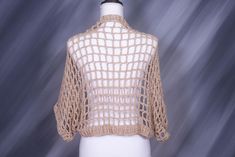 This is an original design that I came up with. I thought it would be really cool to have a crocheted shawl be wearable during the summer months. I went with a very lightweight yarn and made a very loose mesh pattern. It will look so cute over a tank top or bathing suit. The perfect finish to your summer outfit to help bring it up just a notch.   Size: M/L Overall Length: 37 " Body Opening: 30" Top to Bottom: 21" Machine wash but dry flat. All in stock items are ready to ship, no waiting.  All items will arrive freshly washed and all items are individually packaged.  To see the rest of my shop please click the following link, CuddleMeSoftlyDaily.etsy.com Spring Open Knit Cover-up In One Size, Spring Crochet V-neck Cover-up, Sheer Sleeveless Summer Cover-up, Fitted Open Knit Bohemian Cover-up, Sleeveless Crochet Cover-up For Summer, Bamboo Yarn, Jumpers And Cardigans, Cardigans For Women, Digital Pattern