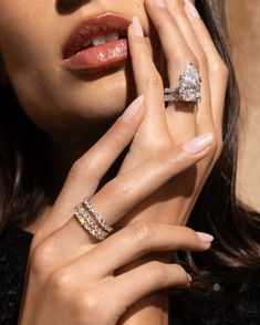 a woman with three rings on her finger