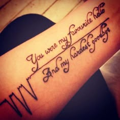 a woman's arm with the words, you are my favorite kid and randy & scotty on it