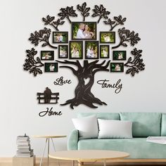 the family tree wall decal is shown with photos and frames on it's side