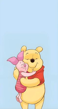 winnie the pooh and piglet hugging each other in front of a blue background