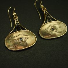 "Ancient Egypt eye of Horus earrings hand carved. The Eye of Horus is an ancient Egyptian symbol of protection, royal power, and good health. The Eye of Horus is similar to the Eye of Ra, which belongs to a different god, Ra, but represents many of the same concepts. The eye of Horus was often used to symbolise sacrifice, healing, restoration, and protection. Funerary amulets were often made in the shape of the Eye of Horus. The symbol \"was intended to protect the pharaoh in the afterlife\" and to ward off evil. Ancient Egyptian and Middle-Eastern sailors would frequently paint the symbol on the bows of their vessels to ensure safe sea travel. Horus was the ancient Egyptian sky god who was usually depicted as a falcon. His right eye was associated with the sun god, Ra. The eye symbol repr