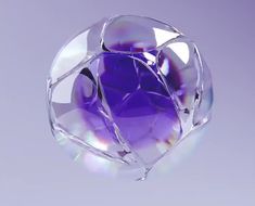 a close up of a glass object on a table