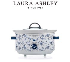 an advertisement for the laura ashley slow cooker with blue flowers on it