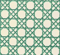 a green and white tile pattern with circles