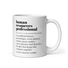 a white coffee mug with the words human resources professional in black on it, against a white background