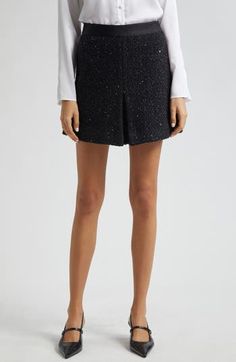 Metallic threads add sparkle and shine to this wool-blend tweed miniskirt perfected with crisp pleats and an A-line silhouette. Hidden side-zip closure Decorative flap pockets Lined 36% virgin wool, 35% polyester, 28% polyamide, 1% acrylic with 100% polyester contrast Dry clean Imported Elegant Tweed Mini Skirt With Lining, Elegant Tweed Lined Mini Skirt, Elegant Tweed Pleated Skirt, Elegant Mini Tweed Dress, Formal Tweed Mini Skirt, Elegant Tweed Mini Bottoms, Formal Elegant Tweed Mini Skirt, Elegant Tweed Mini Skirt For Formal Occasions, Fitted Tweed Mini Skirt For Party