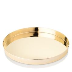 an oval gold tray on a white background