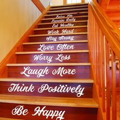 there is a stair case that has many words on the steps and it says, be happy