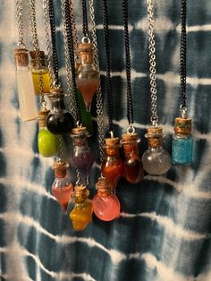 Create your own sparkly magical potion bottle necklace! Each necklace is handmade and unique to each creator. Magic is all around us, and can be used in any number of ways. Colors can be a great way to manifest and attract the energies you want to surround yourself with. These magical bottles are a fantastic addition to any outfit, cosplay or costume! These necklaces also make great fidget toys with the color shifting liquid inside. Each order is for one customized bottle and chain! Ren Faire Necklace, Witch Potion Necklace, Potion Maker Outfit, Tiny Potion Bottles, Ren Fair Trinket Trading, Ren Faire Trinket Trading, Resin Potion Bottles, Diy Potion Bottles Liquid, Ren Faire Trinket Trading Ideas