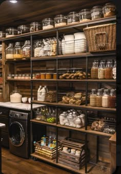 the shelves are filled with various items in baskets and containers, along with washing machine