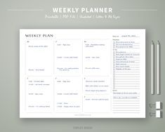 the weekly planner is shown on top of a table