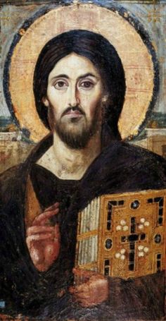 an icon of jesus holding the cross