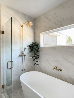 Lowe’s stand alone tub inside tiled custom shower in custom home build gold fixtures modern bathroom ideas Free Standing Bath Tub Shower Combo, Stand Alone Bathtub, Soaking Tub Shower Combo, Freestanding Bathtub Shower, Bathroom Tub Shower Combo, Bathroom 2024