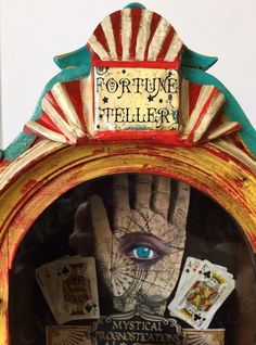 an antique fortune teller with playing cards in it