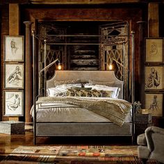 a large bed sitting in the middle of a bedroom next to a chair and table