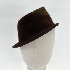 Small hat for self-decoration. Colour Espresso brown Material 100% wool Head circumference one size fits all The hat is already decorated with a grosgrain ribbon and a hat elastic on the inside. Brown Short Brim Fur Felt Hat, Brown Felt Fedora With Curved Brim, Brown Fur Felt Fedora With Short Brim, Fitted Brown Felt Hat, Brown Brimmed Fur Felt Top Hat, Brown Wool Felt Hat With Curved Brim, Brown Fur Felt Brimmed Top Hat, Brown Wool Fedora With Flat Brim, Fitted Brown Wool Top Hat