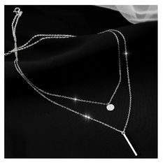 This Sterling Silver necklace comes with a cubic zirconia pave set charm on the shorter silver chain and a silver bar hanging from the longer silver chain. A beautiful accessory for a night out and perfect as a gift.  Our sterling silver layer necklace comes in stylish white gift box, ideal for gifting and with FREE delivery worldwide.   Features - 925 Silver Layered Necklace - Crystal set charm - Silver solid bar - Extension chain  - FREE Delivery Worldwide  - Gift wrapping available Returns & Chain Layering, Women Choker Necklace, Double Necklace, Double Layer Necklace, Womens Chokers, Multi Layer Necklace, Long Pendant Necklace, Long Pendant, Layering Necklace