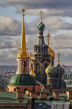 an ornate building with gold and blue domes