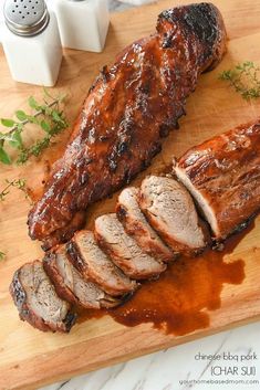 the meat is sliced up and ready to be served on the cutting board for consumption