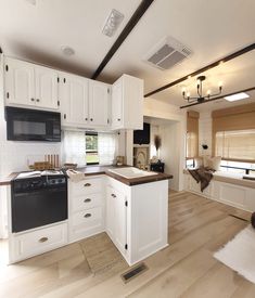 the kitchen is clean and ready for us to use in its new owner's home