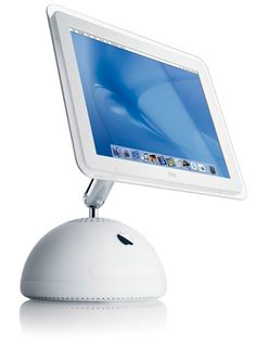 a computer monitor sitting on top of a white desk