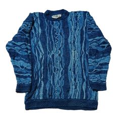 Vintage 90s Coogi Blues Australia Crewneck Sweater - Iconic Retro Knitwear Step back into the vibrant 90s with this authentic vintage Coogi Blues Australia crewneck sweater! Known for their intricate, bold designs and luxurious feel, Coogi sweaters are timeless pieces that add a unique flair to any wardrobe. This sweater, with its signature Coogi Blues pattern, is a rare find and a must-have for any vintage fashion enthusiast. Features: Era: 1990s Brand: Coogi Blues Australia Material: 100% Cott Blue Pattern Sweater, Retro Blue Fall Sweatshirt, Blue Retro Winter Sweatshirt, Retro Blue Long Sleeve Sweater, Blue Long Sleeve Retro Sweater, Retro Blue Crew Neck Sweater, Blue Retro Crew Neck Sweater, Retro Blue Winter Top, 90s Fitted Crew Neck Sweater