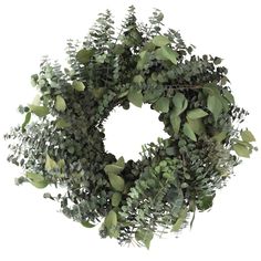 a wreath made out of green leaves on a white background