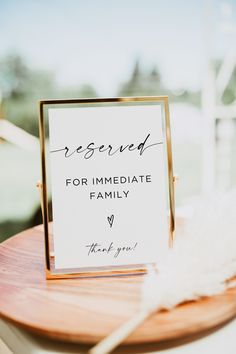 a sign that says reserved for immediate family and thank you on the side of a table