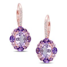 Amp up her evening-ready wardrobe with the ravishing good looks of these tantalizing gemstone drop earrings. Fashioned in sterling silver with rose rhodium plate, each earring dazzles with a 9.0 x 7.0mm oval-shaped light purple amethyst center stone wrapped in a gorgeous frame of smaller oval-shaped bright purple amethyst alternating with round soft-purple Rose de France amethyst. Glittering white topaz line the slender ear wire above. Promising endless sparkle and shine, these exceptional earri Zales Zales, Gemstone Drop Earrings, Peoples Jewellers, Necklace For Girlfriend, Bright Purple, Mens Pendant, Engraved Necklace, Bridesmaid Earrings, White Topaz