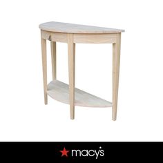 a wooden table with a shelf on the bottom and an inscription that reads macy's