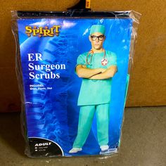 a man in scrubs is standing with his arms crossed and wearing glasses on it