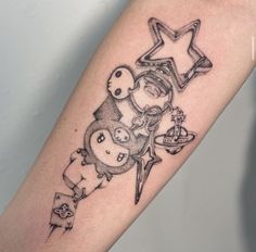 a person with a tattoo on their arm has an image of two people and a star