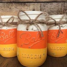 three mason jars with the words rad bacon painted on them