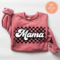 If you're looking for a thoughtful and practical gift, our apparel is sure to be appreciated by anyone who receives it. These retro mama sweatshirts are handmade to order on an ultra-soft crewneck that will quickly become your go-to apparel item! Our trendy checkered mama hoodies are made with eco-friendly water-based ink that feels good and lasts longer! You will never want to take it off! ♥Sizing info♥ *Unisex sizing. *Order your true size for a more fitted feel. Size up for a slouchier look ♥ Crew Neck Cotton Hoodie For Mother's Day, Crew Neck Cotton Hoodie, Fall Letter Print Hoodie As Gift, Fall Letter Print Hoodie Gift, Cotton Sweatshirt With Lettering For Gift, Cotton Pre-shrunk Sweatshirt As Gift, Long Sleeve Sweatshirt With Lettering As Gift, Custom Print Sweatshirt For Fall Gift, Fall Gift Sweatshirt With Custom Print