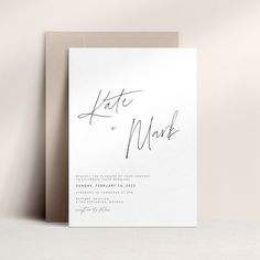 a wedding card with the word kate and mark written on it in cursive ink