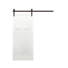 an open white barn door with two black bars on the bottom and one brown bar at the top