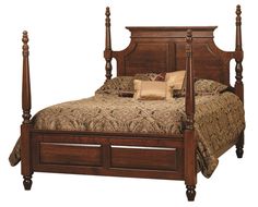 a wooden bed with four posts and pillows on it's headboard, against a white background